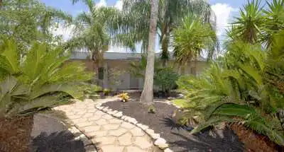 Avenue-J-House-2-Patio-to-House_web Avenue-J-House-2-Patio-to-House_web